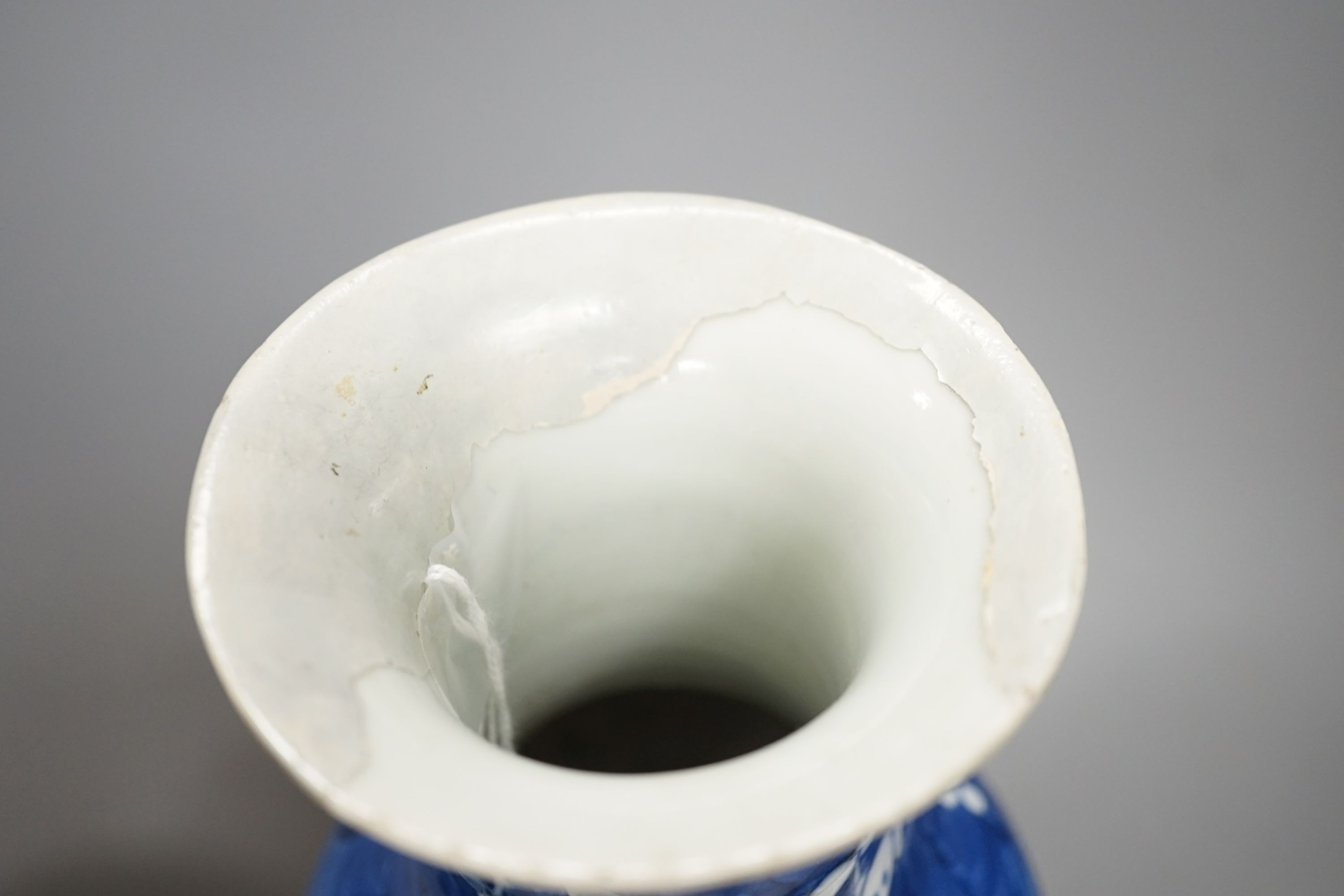 A Chinese blue and white prunus vase together with three similar jars. Vase height 30cm